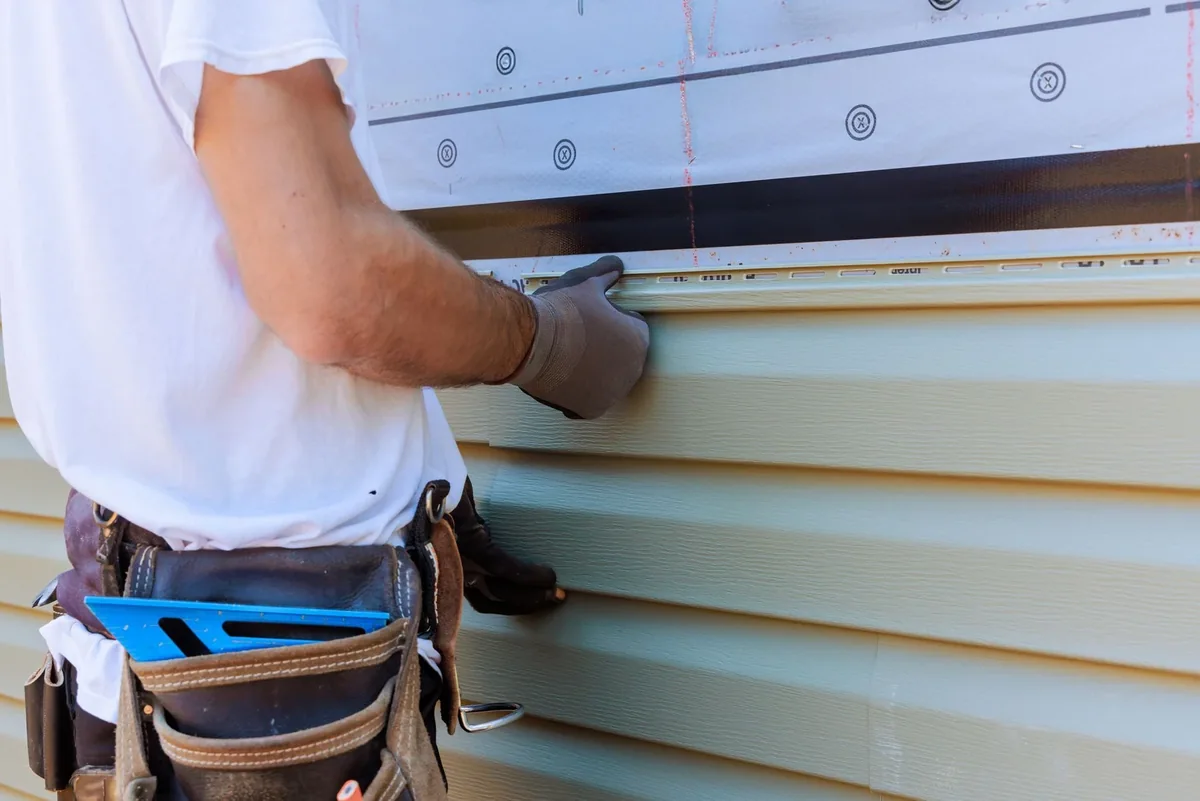 Siding specialist at work